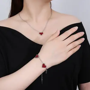Guangzhou alta gioielli 18K placcato oro acciaio inossidabile titanio uomo donna rosso cuore bracciale collana set catena a maglie