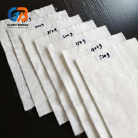 Géotextile en PET à longs fibres non tissées, résistant aux perforations (plus de 2,5 kN CBR), utilisé pour le drainage souterrain et la séparation des couches de sol dans les pavés.