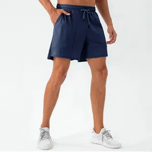 Logo personnalisé séchage rapide lâche Nylon Spandex course entraînement athlétique Fitness serviette boucle poches hommes sport Gym Shorts pour hommes