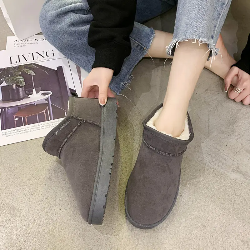 Yeni moda koyun derisi deri kar botları kadınlar için doğal yün kürk astarlı kısa Mini kış sıcak günlük çizmeler ayak bileği ayakkabı