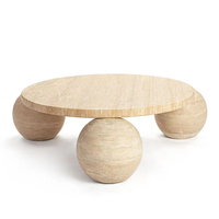 Table basse italienne minimaliste de luxe léger avec base sphérique, design circulaire moderne et créatif