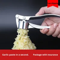 Les outils à main en acier inoxydable sont des ustensiles de cuisine écologiques utilisés pour écraser l'ail et le gingembre