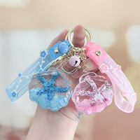 Porte-clés en acrylique en forme d'étoile de mer avec bouteille flottante pour sable mouvant, idéal pour voiture, sac à dos d'étudiant, petit cadeau, ornement suspendu