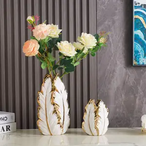 Lüks İskandinav Modern sırlı muz yaprağı ev otel için dekoratif altın seramik vazo çiçek