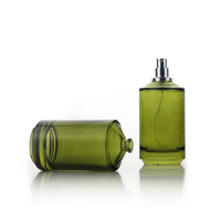Flacon de parfum vide de luxe haut de gamme 100 ml transparent vert olive avec design d'épaule spécial et vaporisateur de brume parfumée