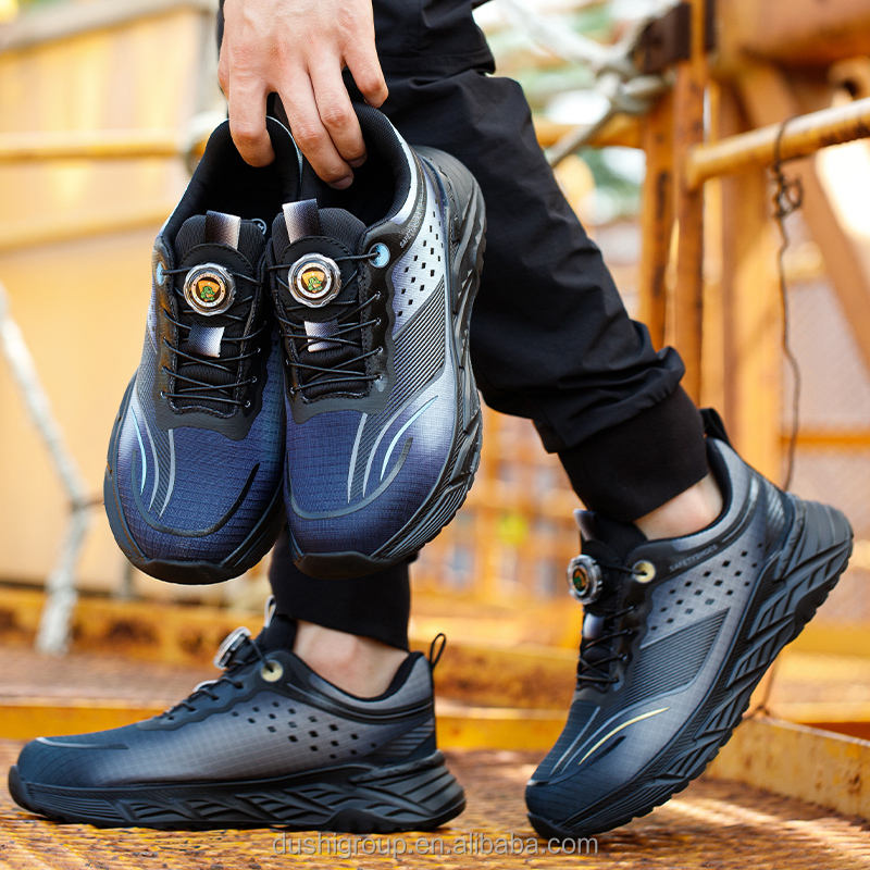 Nuevos zapatos de seguridad de moda para hombres y mujeres de corte bajo,  zapatos de trabajo planos transpirables con botones giratorios