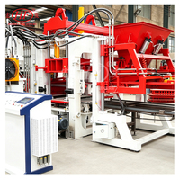 Machine de fabrication de briques entièrement automatique QT10-15F, économie de main-d'œuvre avec contrôle complet du cycle de production