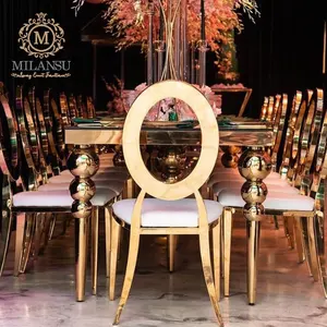 Modern elegant stainless steel round back wedding dining chairs with gold legs for bride and groom