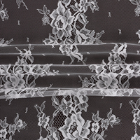 Tissu en dentelle française de la plus haute qualité, motif floral, dentelle élégante et raffinée pour robes