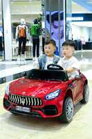 Voiture électrique de luxe pour enfants, modèle compact deux places en plastique, alimentée par batterie, avec éclairage et musique