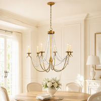 Lustre Cano Lighting en cristal doré, bras en métal courbés avec lumières de bougies, éclairage de plafond pour la maison à lueur chaude