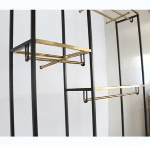 Clothing Store Display Rack Shiny Gold Stainless Steel Cloth Stand Fashionable Metal Rack For Clothing Presentation
