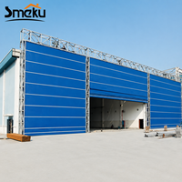 Puerta Seccional Aislada Comercial con Paneles Sándwich de Acero para Proyectos de Puertas de Carga de Fábrica
