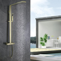 Ensemble de douche thermostatique mural en cuivre brossé minimaliste moderne avec pomme de douche à bulles et pluie
