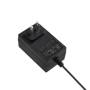 อะแดปเตอร์จ่ายไฟ12V1A FCC US อะแดปเตอร์แปลงไฟสำหรับกล้องวงจรปิดปลั๊ก ac/dc สำหรับไฟ LED Strip lpoem 12W 12V1000MA ODM - Product Image 1