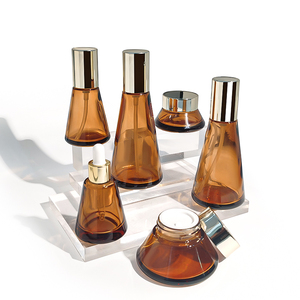 Tùy Chỉnh Màu Sắc Biểu Tượng Mặt Kem Mỹ Phẩm Jar Hổ Phách Hình Dạng Giọt Rỗng 30G 50G Lọ Thủy Tinh Với Vàng Có Nắp Đậy - Product Image 5