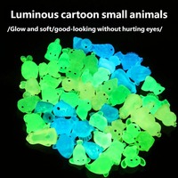 Figurines d'animaux de dessin animé de haute qualité qui brillent dans le noir (lapin/chiot) en résine pour la décoration d'aquarium