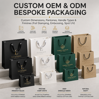 Sac shopping en papier noir de luxe personnalisé 300 g/m² avec logo estampé à chaud or et poignée en ruban satiné pour boutique