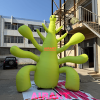 Créature extraterrestre gonflable géante vert lime pour scène de festival de musique, monstre gonflable à tentacules sur mesure pour décoration d'événements extérieurs
