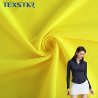 Tissu en nylon et élasthanne brillant et extensible dans les quatre sens, 220 g/m², tricot uni, pour combinaisons de surf et vêtements de sport