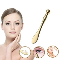 Cuillère pour le visage en métal doré avec logo personnalisé Applicateur de crème oculaire pour le massage du visage Outils de maquillage Spatule cosmétique