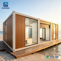 Maison conteneur modulaire de luxe extensible, petite maison préfabriquée pliable pour l'extérieur, portique en verre pliable en conteneur