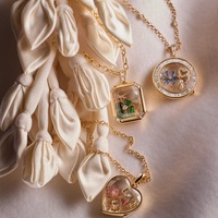 Collier à chaîne en bambou avec pendentif en verre soufflé à la main, très vendu, pour le commerce transfrontalier Europe-Amérique ; Accessoires DIY, pendentif photo creux ouvrable