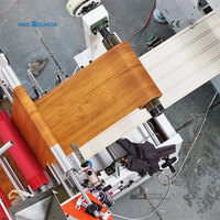 Machine de laminage de panneaux et de films Sino-holyson pour panneaux rainurés en PVC WPC, 37 kW, vitesse de laminage de 19 po/min, automatique