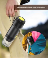 Machine à expresso portable en acier inoxydable argenté, rechargeable par USB, double compatibilité (capsules et café moulu) pour les déplacements