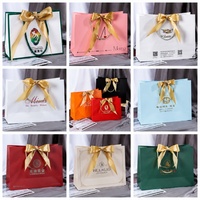 Emballage de luxe personnalisé pour bougies, sac cadeau recyclable avec lamination, impression offset, poignée longue, sac de shopping en papier d'art à ouverture large
