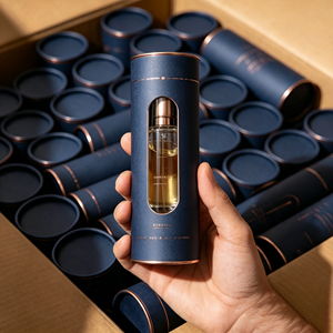 Boîte à parfum ronde en papier de luxe personnalisée avec fenêtre en PVC, estampage à chaud, emballage cadeau en tube cylindrique pour cosmétiques - Product Image 1