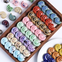 Perles en céramique en forme d'escargot de mer de 21*16 mm, peuvent être utilisées comme boucles d'oreilles, bracelets, colliers, etc.
