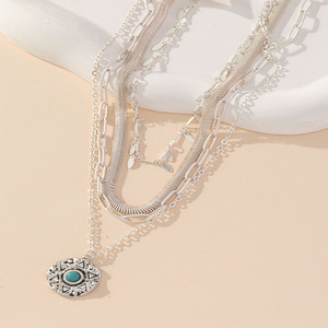 Collar con colgante de turquesa de varias capas estilo europeo americano, cadena retro para clavícula, diseño geométrico de estrella, plata tibetana - Product Image 1