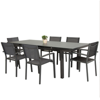 Table à manger moderne personnalisée fabriquée en Chine ensemble table à rallonge et 6 chaises dessus de table en verre facile à nettoyer pour l'extérieur