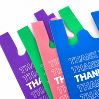 Sacs en T-shirt multicolores imprimés « Merci » recyclables et imperméables avec poignées découpées pour l'emballage de vente au détail et la vente en gros