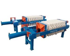 Chain linked mechanical open discharge chamber filter press