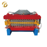 Machine de formage à froid de tôles de toiture ondulées à double couche