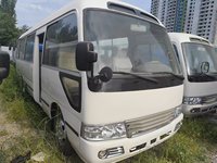 Autobus commercial d'occasion Coaster 20-23 places, moteur diesel Cummins manuel, plus de 8L, norme d'émission Euro 4