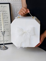 Boîte de transport portable de luxe en cuir haut de gamme avec nœud papillon octogonal léger, boîte de faveur de mariage, boîte d'emballage pour pâtisserie et pâtisserie