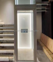 Porte d'ascenseur pliante automatique avec finitions métalliques et en verre, design moderne pour hôpital, hôtel, villa et appartement