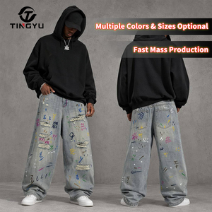 Envío Inmediato: Jeans Anchos de Hombre Estilo Urbano con Graffiti y Efecto Desgastado, Tejido Holgado de Tiro Medio, Lavado Claro, Vaqueros Rotos Pintados Y2K - Product Image 1