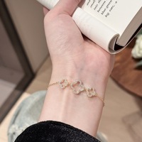 Französisch Casual High-End Damen Full Diamond Zirkon Klee Armband Sweet Flower Shape Gold Nische Charm Fine Chain & Link Design
