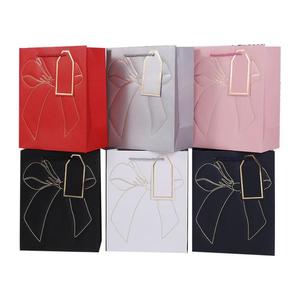 Creative <b>Bow</b> <b>Gift</b> Pouch Customizable Texture Hot Stamping Pattern Pouch Handheld Design Pouch Support Wholesale - Product Image 2