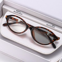 Lunettes de vue photochromiques pour femmes, monture ovale, design imprimé léopard, verres PC pleine monture, effet lifting du visage