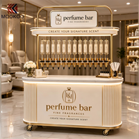 Comptoir de présentation de parfums de luxe sur mesure, station de recharge de parfums mobile, étagère métallique détachable pour les boutiques de parfums