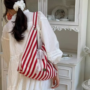 Bolso de lona a rayas para <span class=keywords><strong>mujer</strong></span>, nuevo estilo verano 2026, estampado de letras, bandolera de doble cara, bolso escolar para estudiantes - Product Image 6