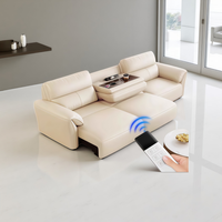Canapé-lit modulaire pliant en cuir crème moderne avec rembourrage en éponge et design rétractable électrique pour appartement et hôtel (trois places)