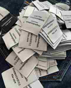 Custom Eco-Friendly Black Woven Clothing Garment Care Labels with One Side Fold and Press Labels for Shirt <b>Jackets</b> - Product Image 4