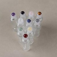 Vente en gros de flacons cylindriques en verre transparent de 5 ml et 10 ml avec bouchon en bambou naturel et bille en pierre précieuse pour huiles essentielles et parfums