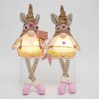 Ensemble de lutins lapins lumineux fantaisistes avec longues jambes pendantes, lumière LED chaude, décoration de printemps et de Pâques pour la maison